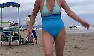 Beautiful Latin mother shows off on the beach in a bikini, masturbates before fucking with her stepson's friend